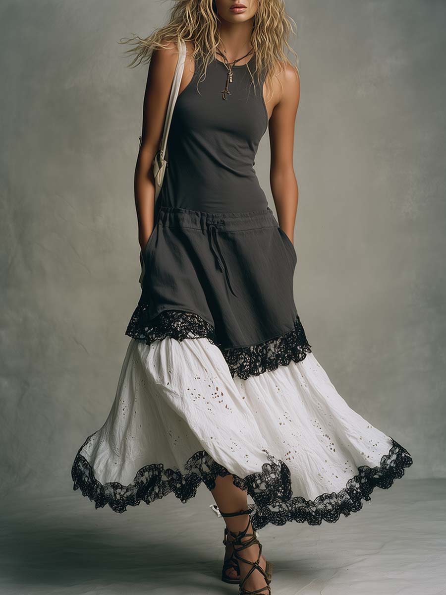 Abito maxi bohemien senza maniche con vita bassa e inserti in pizzo