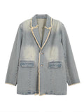 Blazer oversize stile vintage con bordi grezzi